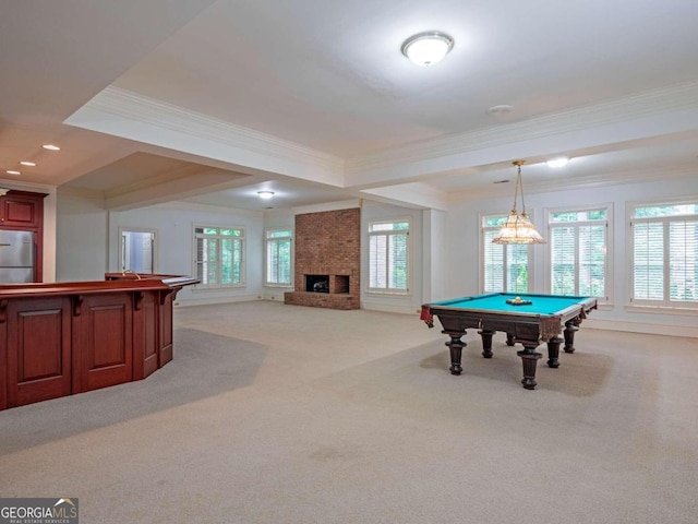 recreation room with a large fireplace, light carpet, and billiards