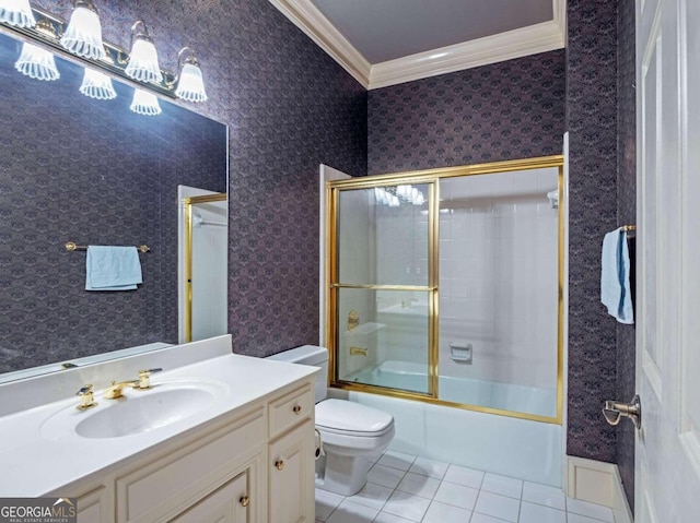 full bathroom with vanity, tile patterned floors, crown molding, bath / shower combo with glass door, and toilet