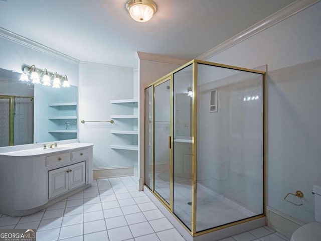 bathroom with a shower with shower door, vanity, tile patterned floors, and crown molding