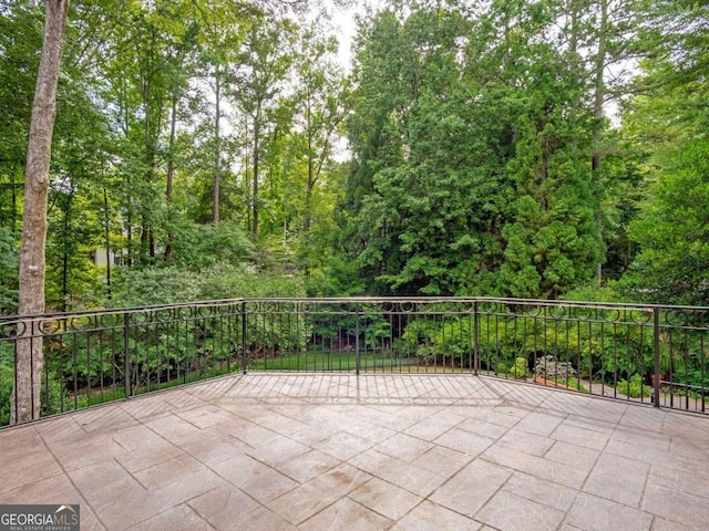 view of patio with a balcony