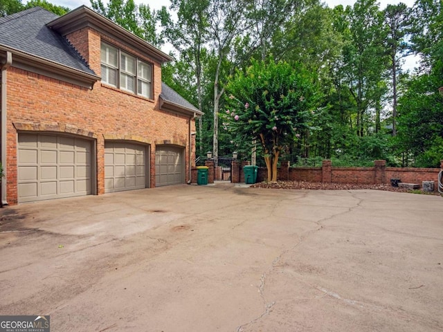 view of property exterior featuring a garage