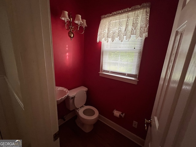 bathroom featuring toilet