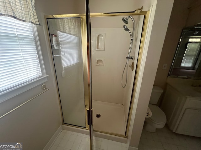 bathroom featuring an enclosed shower, toilet, tile patterned floors, and plenty of natural light