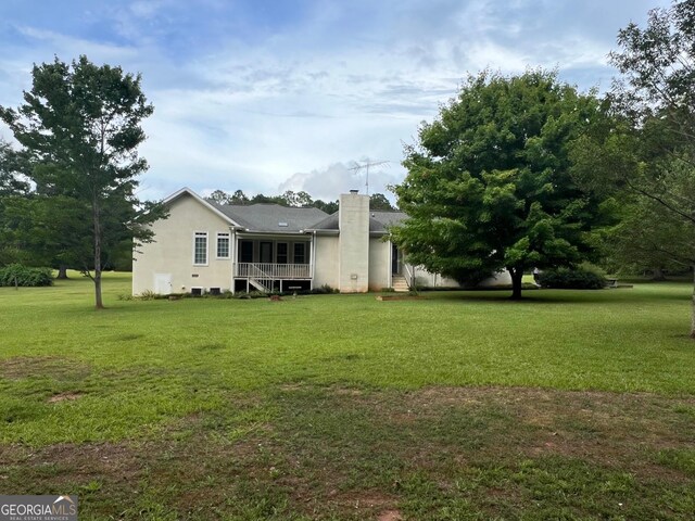 exterior space featuring a lawn