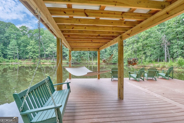 wooden deck with a water view