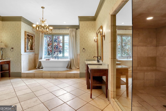 bathroom with ornamental molding, vanity, an inviting chandelier, and tile patterned flooring