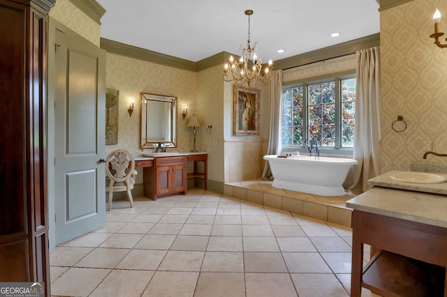 bathroom featuring vanity, crown molding, tile patterned floors, and a tub