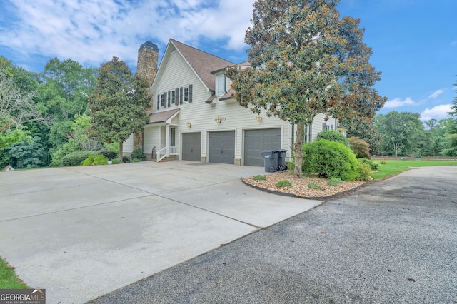 view of property exterior featuring a garage