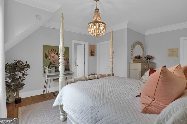 bedroom with a notable chandelier, lofted ceiling, hardwood / wood-style flooring, and crown molding