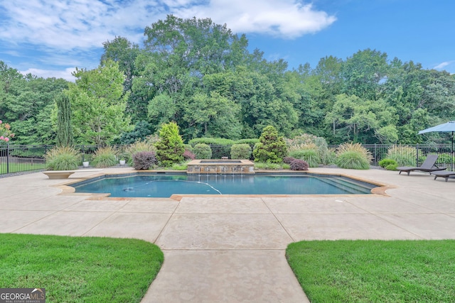 view of pool featuring a patio