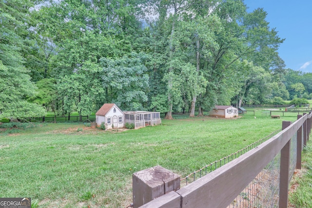 view of yard with a storage shed