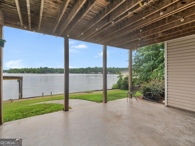 view of patio featuring a water view