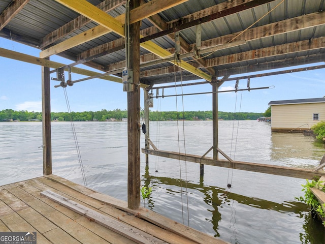 dock area featuring a water view