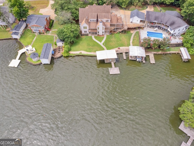 drone / aerial view with a water view