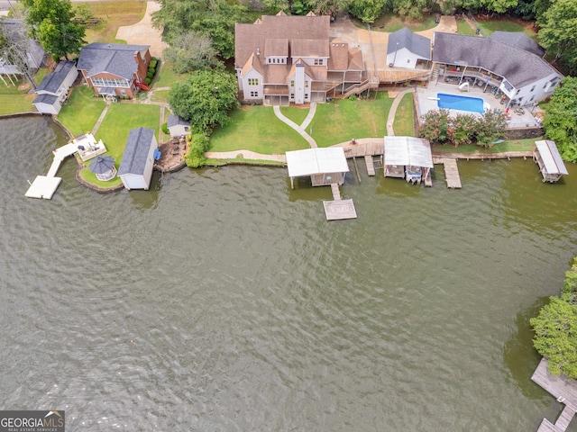 birds eye view of property featuring a water view