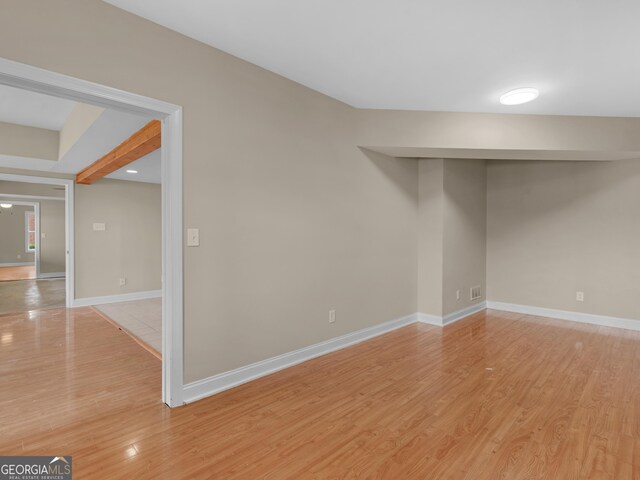 unfurnished room featuring light wood-type flooring