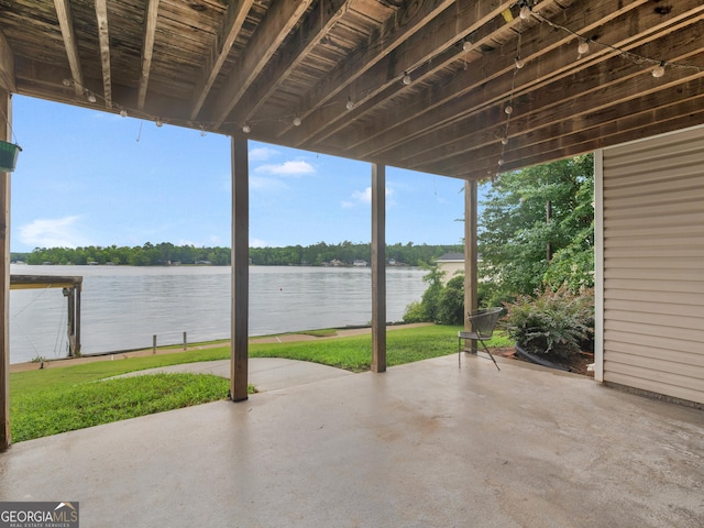 view of patio / terrace with a water view