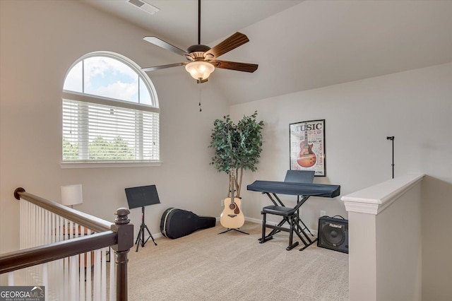 miscellaneous room featuring ceiling fan, lofted ceiling, and light carpet