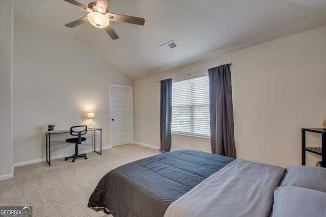 carpeted bedroom with ceiling fan and lofted ceiling