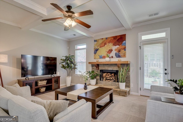 carpeted living room with a fireplace, ornamental molding, and beamed ceiling