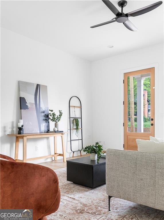 living room with ceiling fan