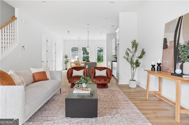 living room with light hardwood / wood-style floors