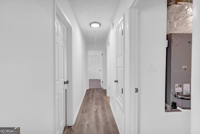 hallway featuring light wood-type flooring