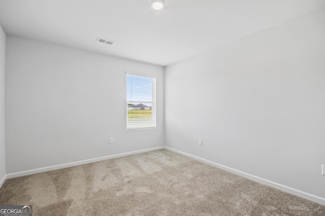 view of carpeted spare room