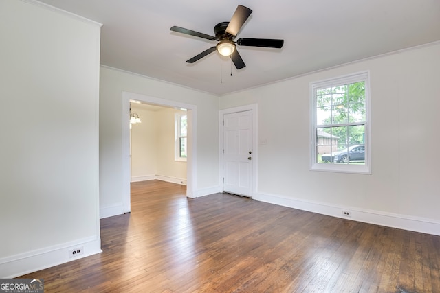 unfurnished room with ornamental molding, ceiling fan, and hardwood / wood-style floors