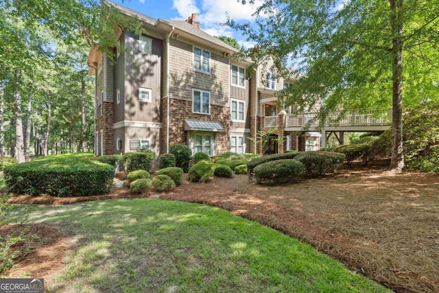 exterior space featuring a lawn