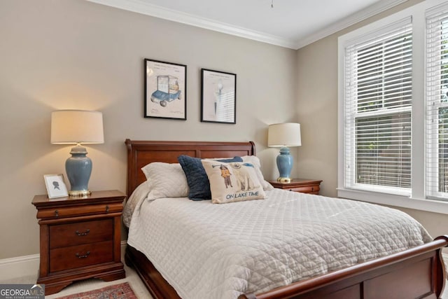 bedroom with crown molding