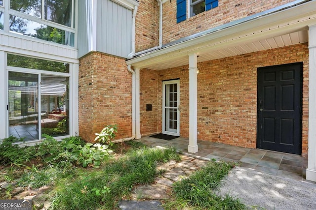 entrance to property with covered porch