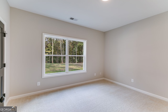 view of carpeted spare room