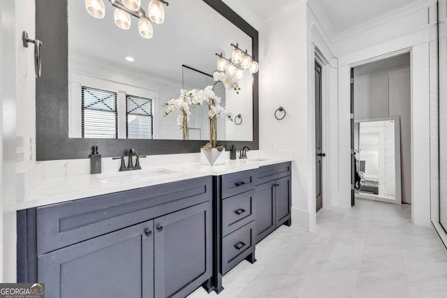 bathroom featuring double vanity, tile patterned floors, and crown molding