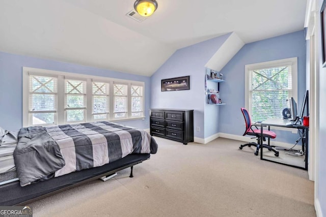 bedroom featuring light carpet and lofted ceiling