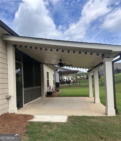 view of patio with ceiling fan