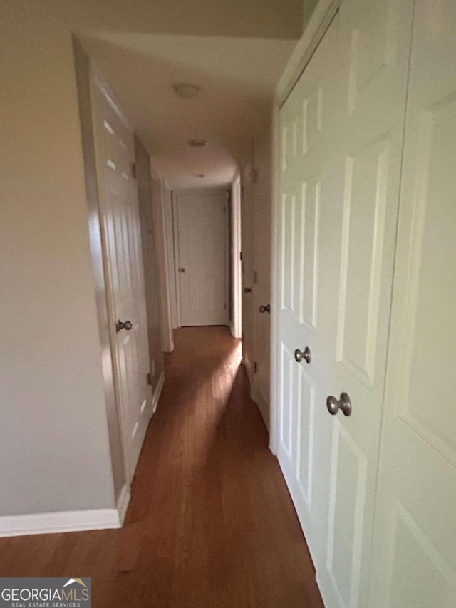 hall featuring dark hardwood / wood-style floors