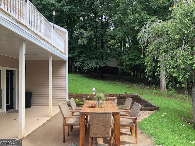 view of patio with a balcony