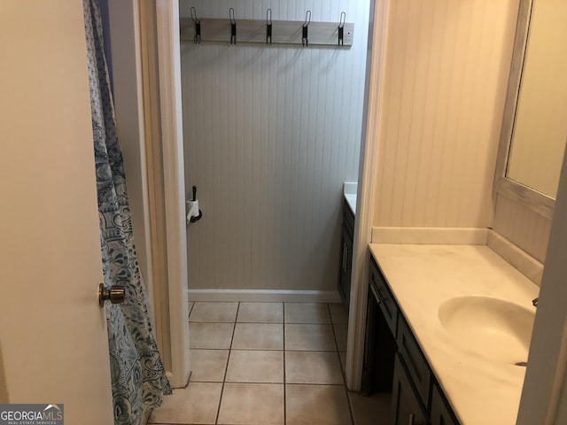 bathroom with vanity and tile patterned flooring