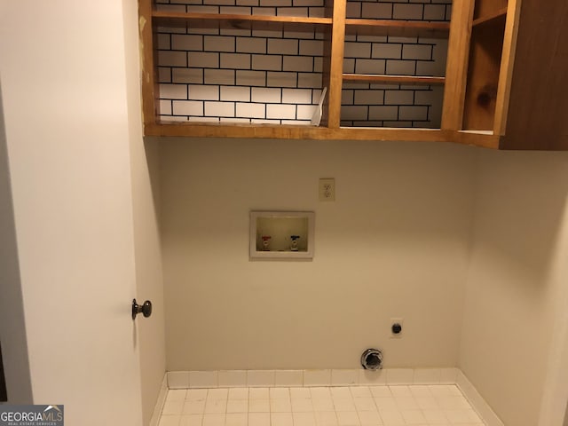 clothes washing area with washer hookup and hookup for an electric dryer