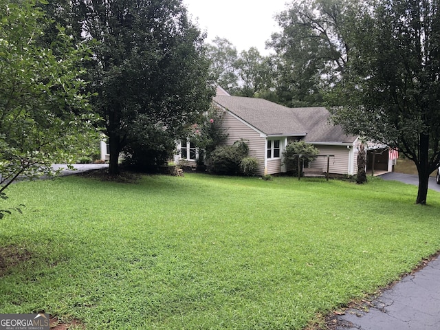 view of yard with a garage