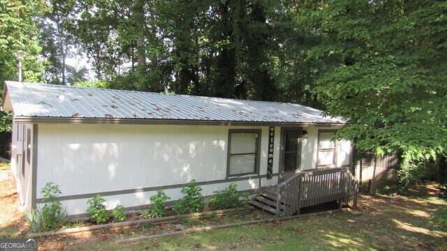 view of front of house with metal roof