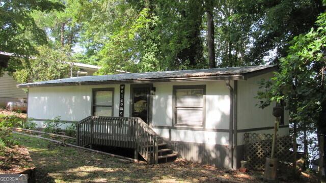 view of front facade with a deck