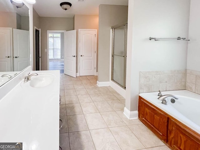 bathroom featuring vanity, separate shower and tub, and tile patterned floors