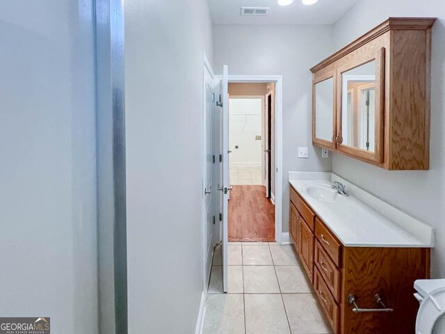 bathroom featuring vanity and tile patterned floors