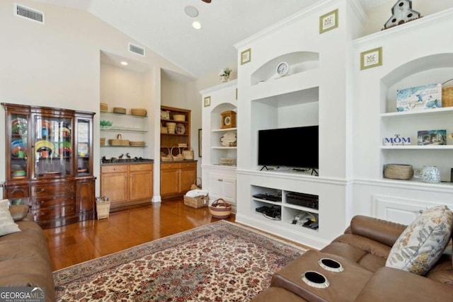 living room with built in features, crown molding, vaulted ceiling, and dark wood-type flooring