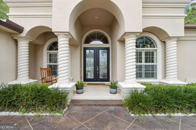 entrance to property with french doors