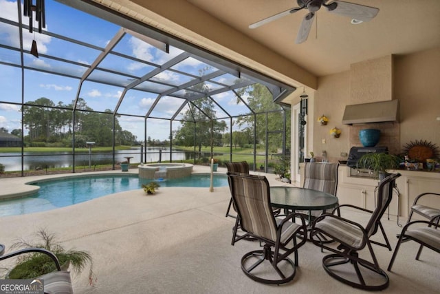 view of swimming pool with a lanai, a patio, an in ground hot tub, and ceiling fan