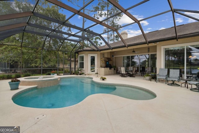 view of swimming pool with an in ground hot tub, a patio, ceiling fan, and a lanai