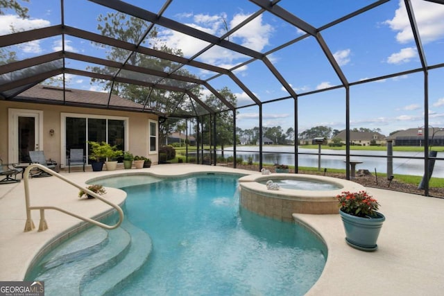 view of swimming pool featuring an in ground hot tub, a lanai, and a patio area